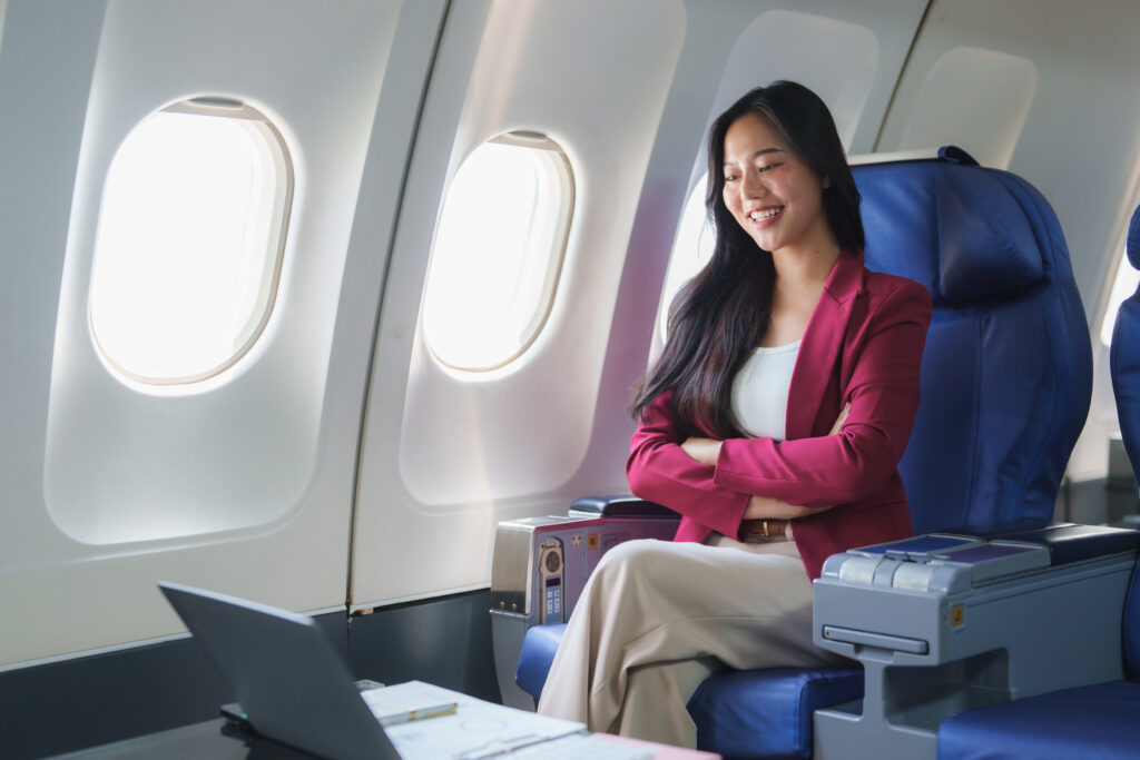 Zakenreiziger geniet van business class New York stoel en service – Vlucht-Ticket.nl
